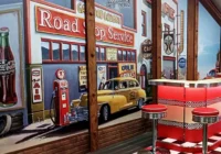 Rote Dinerbar und Sitzgruppe vor einer amerikanischen Panoramakulisse